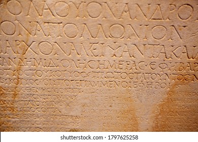 Fragment Of The Ancient Greek Letters Carved On The Stone