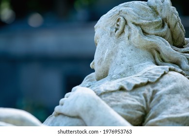 Fragment Of An Ancient Statue Of End Of Human Life. Beautiful Dead Woman Light On The Bed. 