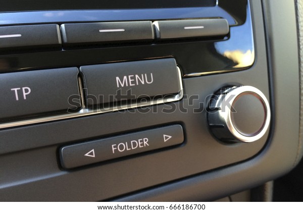Fragment of the audio control panel in a modern\
car closeup