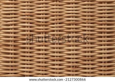 a fragment of a basket made of willow twigs or garden furniture, texture