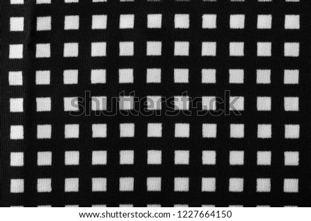 Similar – fragment of black cotton fabric with waves