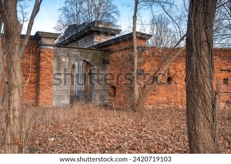 Fragment of a brick wall surrounding a military fortress from tsarist times, execution gate from the back