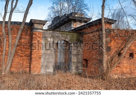 Fragment of a brick wall surrounding a military fortress from tsarist times, execution gate from the back