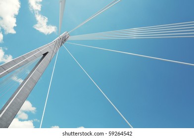 fragment of a cable stayed bridge on the sky background