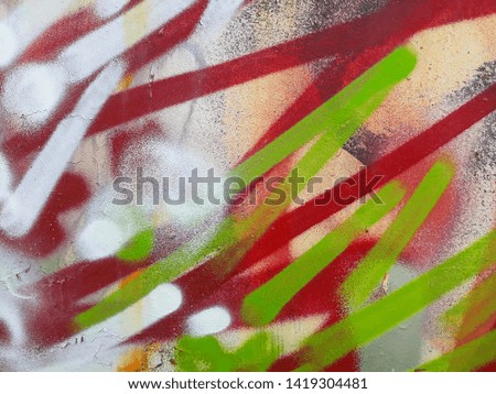 Fragment of colored street abstract art graffiti paintings. texture, background of colorful strokes.