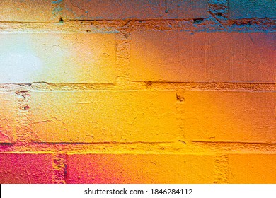 A Fragment Of Colorful Graffiti Painted On A Brick Wall. Abstract Background For Design.