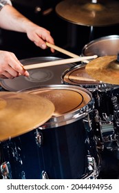 Fragment Of A Drum Kit Close Up. The Drummer Beats The Drum.