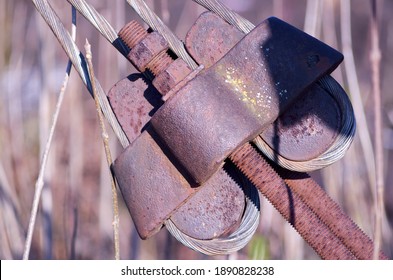 Fragment Of Fastening A Tensioned Steel Cable Close Up