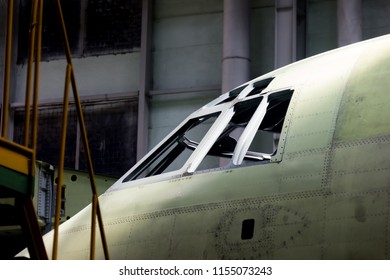 Fragment Of Fuselage New Aircraft At Assembly Line On Plant