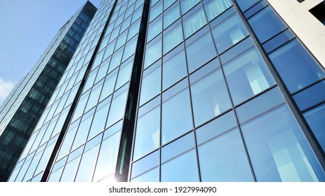Fragment Of Glass And Metal Facade Walls. Commercial Office Buildings. Abstract Modern Business Architecture.