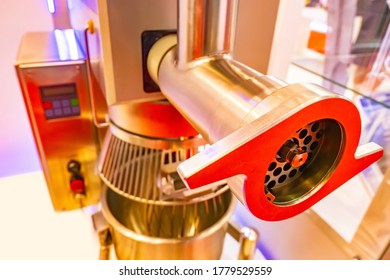 Fragment Of An Industrial Food Processor. Powerful Meat Grinder For Cooking Minced Meat In A Restaurant. Equipment For The Food Industry.  Meat Processing Production. Kitchen Appliances.