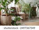 A fragment of the interior with a variety of indoor plants and plaster sculptures. Urban jungle concept. Biophilia design.