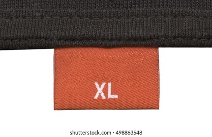 Fragment Of Knitting Fabric With Orange Fabric Tag  