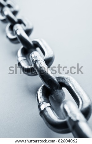Fragment of links of a chain close up