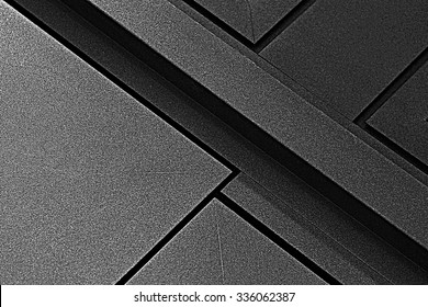 Fragment Of Metal Doors With Anti-corrosion Protective Powder Coating. Industrial Or Technological Background. Architectural Detail. Abstract Geometric Black And White Composition With Strong Diagonal