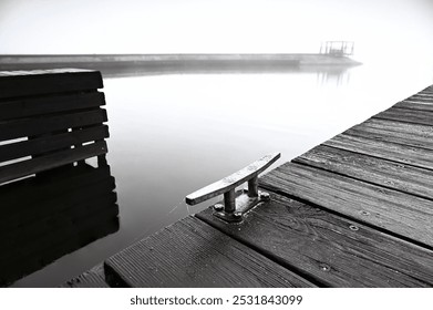  Fragment of a mini-port on the river on a foggy morning, wooden,  pier, black and white - Powered by Shutterstock