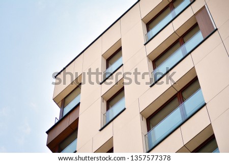 Fragment of a modern apartment building in front. Very modern apartment house.