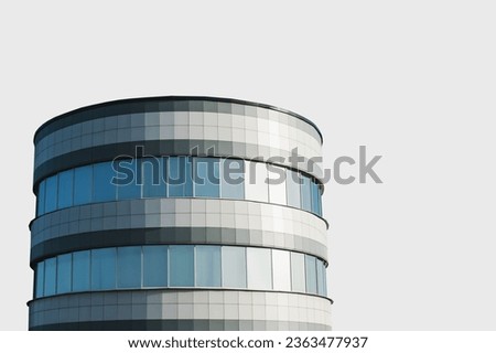A fragment of a modern office building with a round shape