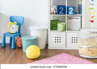 Fragment Of A Multicoloured Children's Play Room With Toys And Storage Solutions