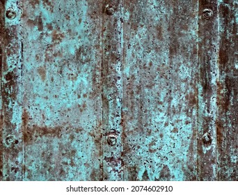 Fragment Of An Old Copper Chest. Oxidized Copper Texture. Close-up.