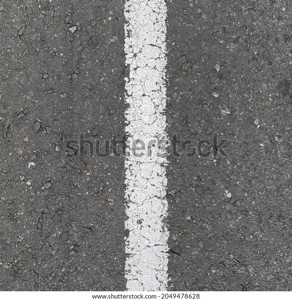 a fragment of an old\
road surface or asphalt with a white dividing line, texture,\
pattern or source