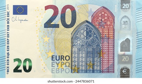 Fragment of one twenty euro money bill. Details of European union currency banknote of 20 euro close up - Powered by Shutterstock