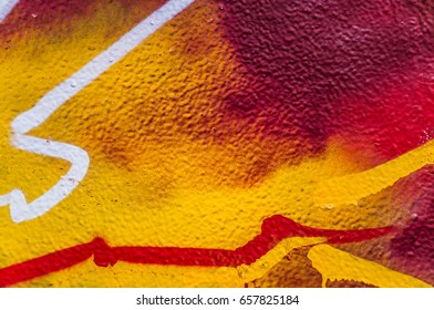 Fragment of a painted plaster wall. Background, texture