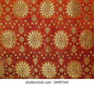 fragment of picture of age-old east carpet with pattern: can be used as background or texture