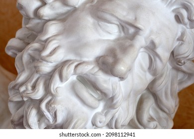 Fragment of the plaster head of the ancient hero Laocoon. Visual aid for students of fine arts.