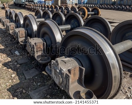 A fragment of the railway infrastructure in Tarnowskie Gory, a city in the north of Upper Silesia with the largest railway junction and a hump in Poland, Wheel sets for wagons on tracks. 