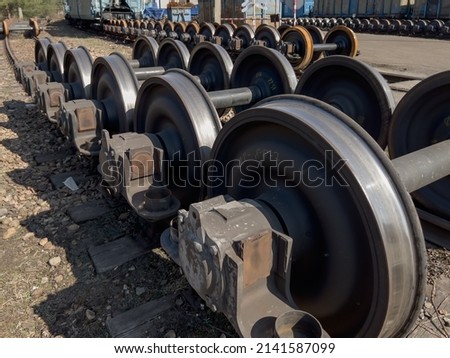A fragment of the railway infrastructure in Tarnowskie Gory, a city in the north of Upper Silesia with the largest railway junction and a hump in Poland, Wheel sets for wagons on tracks.