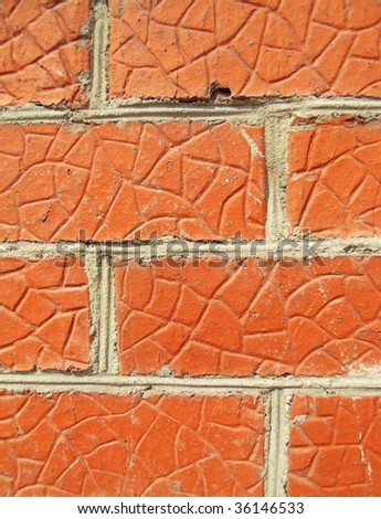 Fragment of red brick wall