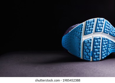 Fragment Of A Sole On Sneaker. The Texture Of The Material Of Sports Shoes. Style Footwear For Running.