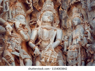 Fragment Of Stone Carved Relief With Musicians Playing Music Of Gods. 12th Century South Indian Temple. Halebidu Heritage, India.