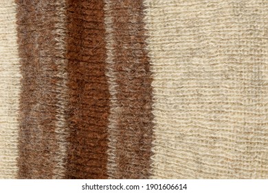 A Fragment Of The Surface Of A Knitted Wool Scarf Close-up