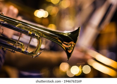  Fragment of the trumpet in the orchestra close-up in gold tones