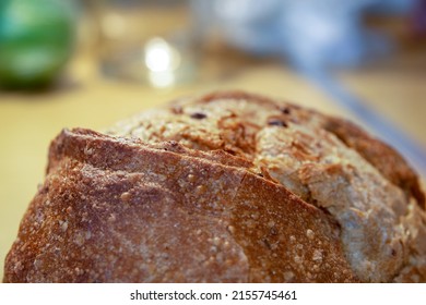 Fragment wheat round bread surface with sprouted grains, sunflower seeds and ruddy crust - Powered by Shutterstock - Get 15% off with code: PIKWIZARD15