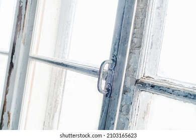 Fragment Of A Wooden Window With Cracked Paint. Selective Focus