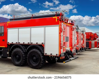 Fragments Of Fire Trucks. Rescue Vehicles. Ministry Of Emergency Situations. Fire Department Vehicle. Parked Fire Trucks Rear View. Car Park Ministry Of Emergency Situations. Parking Rescue Service