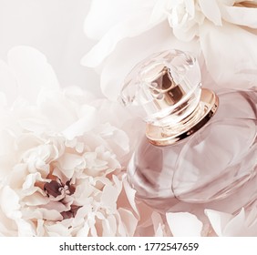 Fragrance Bottle As Luxury Perfume Product On Background Of Peony Flowers, Parfum Ad And Beauty Branding Design