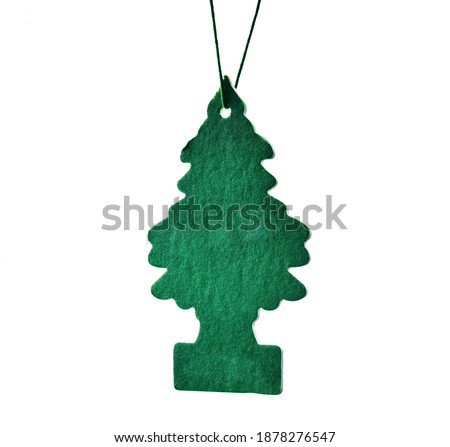 fragrance for the car interior, made in the form of a green tree. concept of fresh air, new year and christmas. copy space. isolated on white.