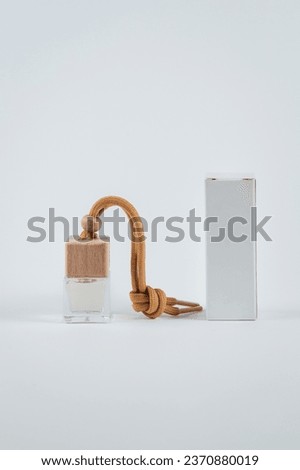 Сar fragrance with white box on white background