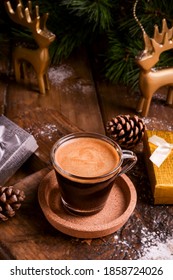 Fragrant Espresso And Christmas Decor On A Wooden Table. Italian Black Coffee With Foam. New Year's Break. Copy Space. High Quality Photo