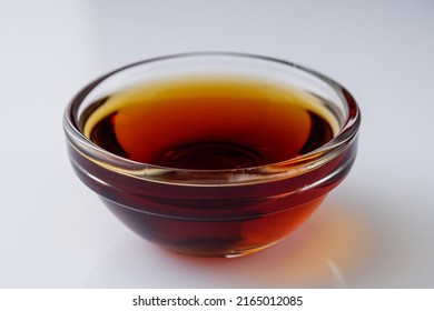 Fragrant Fish Sauce On A White Acrylic Background.