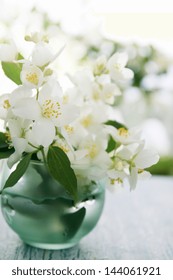 Fragrant Jasmine Bouquet In A Vase On The Table