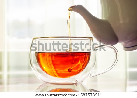 Similar – Foto Bild Tasse mit frischem Kräutertee und Honig