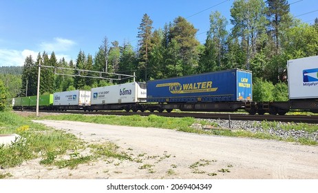 Fraight Train On Electrified Rail Way In The Forest Outside Of Oslo, Norway - July 15, 2021