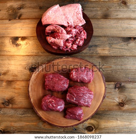 Fraldinha or Flank Steak. Meat cleaned by a butcher on wooden background. meat fat on another board Foto stock © 