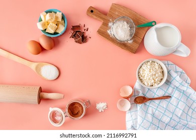 A frame of baking ingredients on a soft pink pastel background. Cooking is flat with a copy space. Top view. Baking concept, layout. Arkistovalokuva