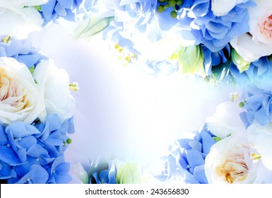 Frame With Blue Hydrangea Flowers And White Rose